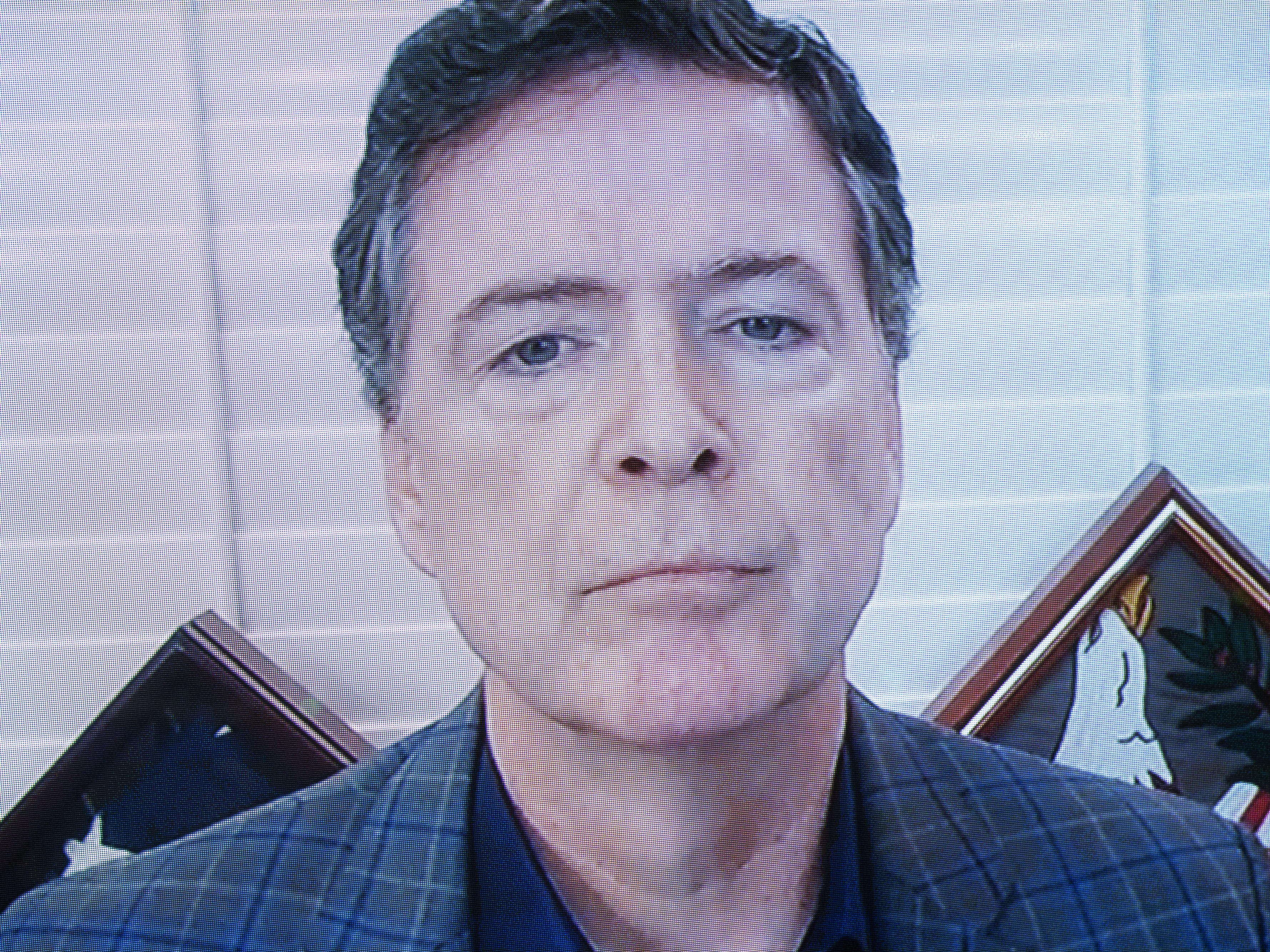 caption: Former FBI director James Comey, pictured testifying remotely at a Senate Judiciary Committee hearing in 2020, is under fire from conservatives for a social media post interpreted as a threat to Trump's life.