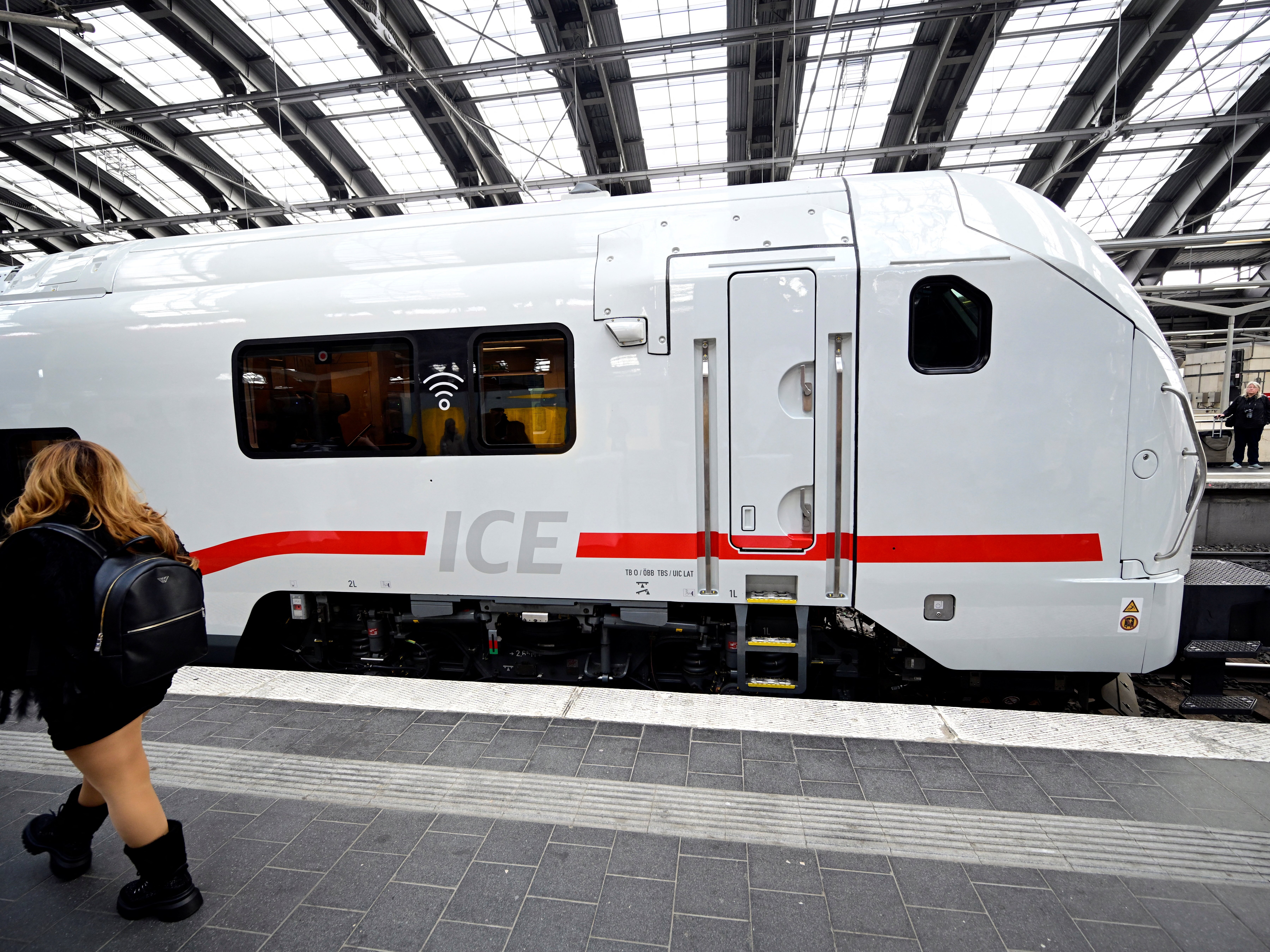 caption: Germany's new Intercity Express train is seen in Berlin prior to its official presentation by railway operator Deutsche Bahn, on Oct. 17.