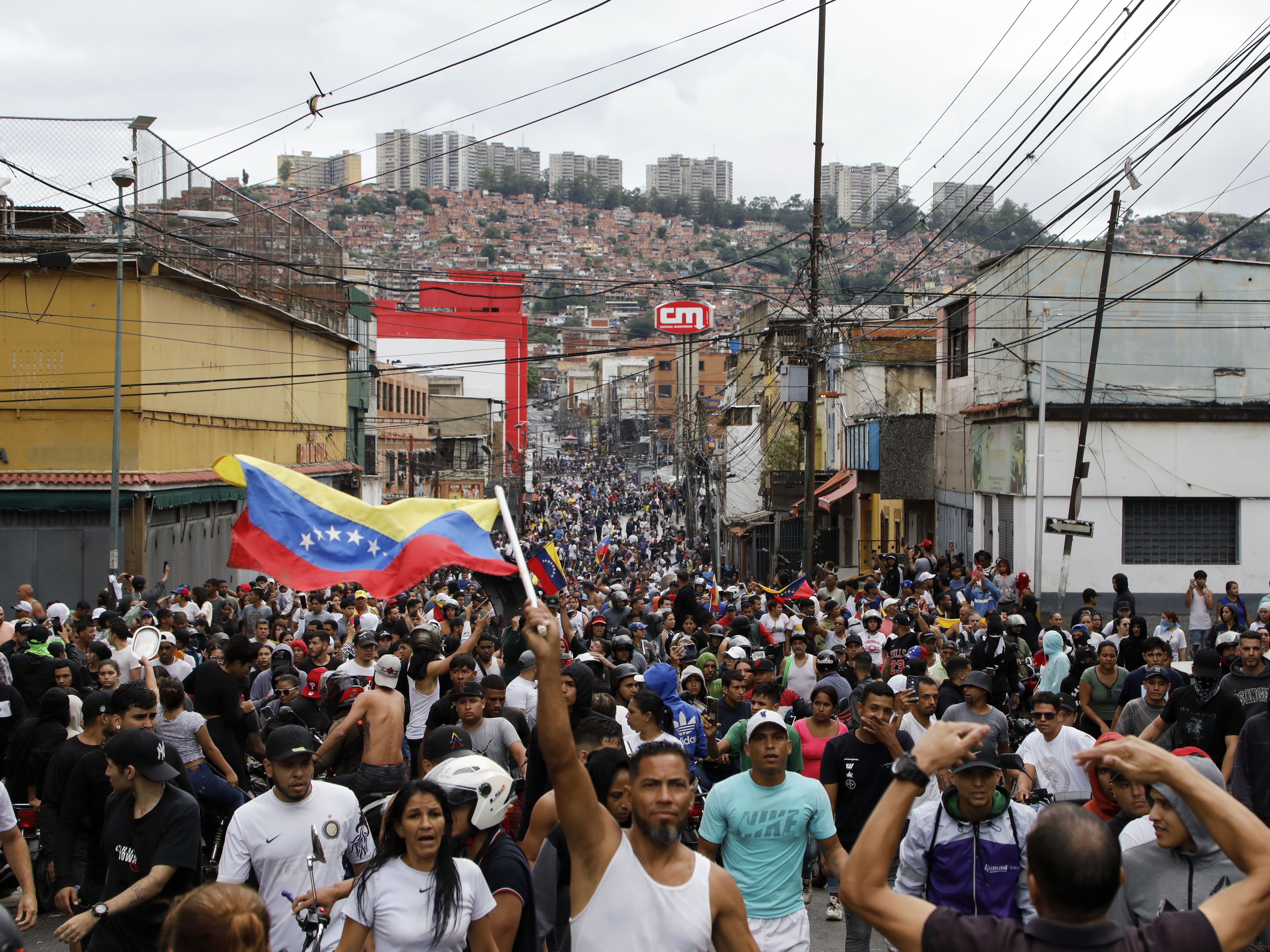 caption: Protesters demonstrate on July 29 in Caracas, Venezuela, against the official election results declaring President Nicolás Maduro won reelection. 