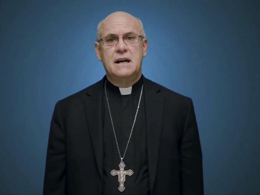 caption: In this photo taken from video, Bishop Kevin Rhoades of Fort Wayne-South Bend, Ind., head of the doctrine committee for the U.S Conference of Catholic Bishops, addresses the body's virtual assembly regarding a formal statement on the meaning of the Eucharist in the life of the church on Thursday.