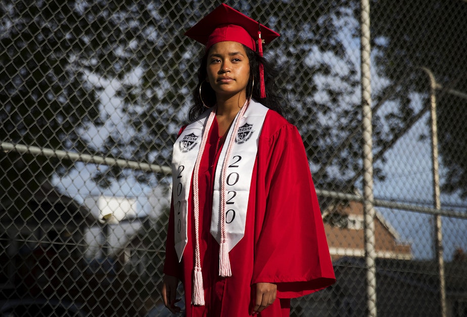 caption: Adyana Luna, a senior at Ballard High School, stands for a portrait on Sunday, May 24, 2020, in Seattle. "I spent four years of my life working towards the goal of walking across the stage to have my family in the crowd to see me graduate, and I think that’s kind of hard because I know it will not be like that," said Luna. "I think it's really sad."