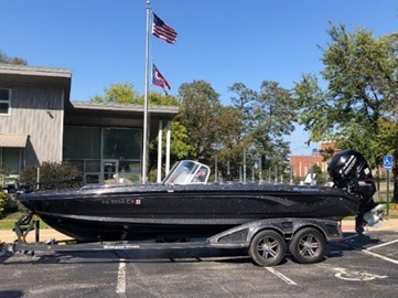 caption: Authorities seized Chase Cominsky's fishing boat and trailer as a tool of crime, after he and his fishing partner were indicted on charges of cheating in a fishing tournament.