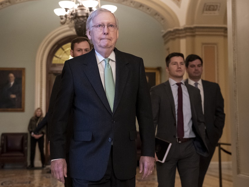 caption: Senate Majority Leader Mitch McConnell, R-Ky., leaves the chamber after criticizing the House Democrats' effort to impeach President Trump.