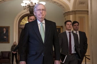 caption: Senate Majority Leader Mitch McConnell, R-Ky., leaves the chamber after criticizing the House Democrats' effort to impeach President Trump.