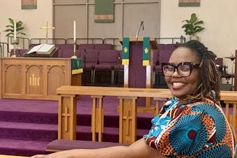 caption: Rev. Kimberly Scott is the newly-installed pastor at Grace United Methodist Church in South Los Angeles. She decided to stay in the church, believing a change for greater LGBTQ acceptance is coming.