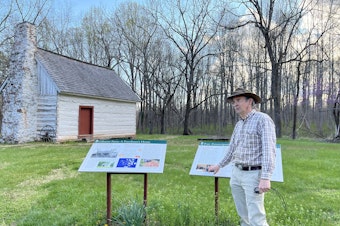 caption: Matt Reeves, a former employee of Montpelier who was fired this week, pictured outside of the historic Gilmore cabin at Montpelier.