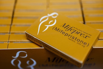 caption: Packages of Mifepfex, the brand-name version of mifepristone, seen at a family planning clinic in Rockville, Md.