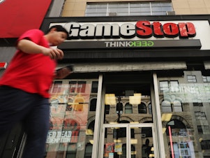 caption: Video game retailer GameStop has seen its stock soar, driven higher by a group of amateur day traders on Reddit, who are taking on Wall Street hedge funds. The frenzy has gotten the attention of regulators and lawmakers.