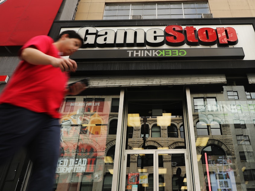 caption: Video game retailer GameStop has seen its stock soar, driven higher by a group of amateur day traders on Reddit, who are taking on Wall Street hedge funds. The frenzy has gotten the attention of regulators and lawmakers.