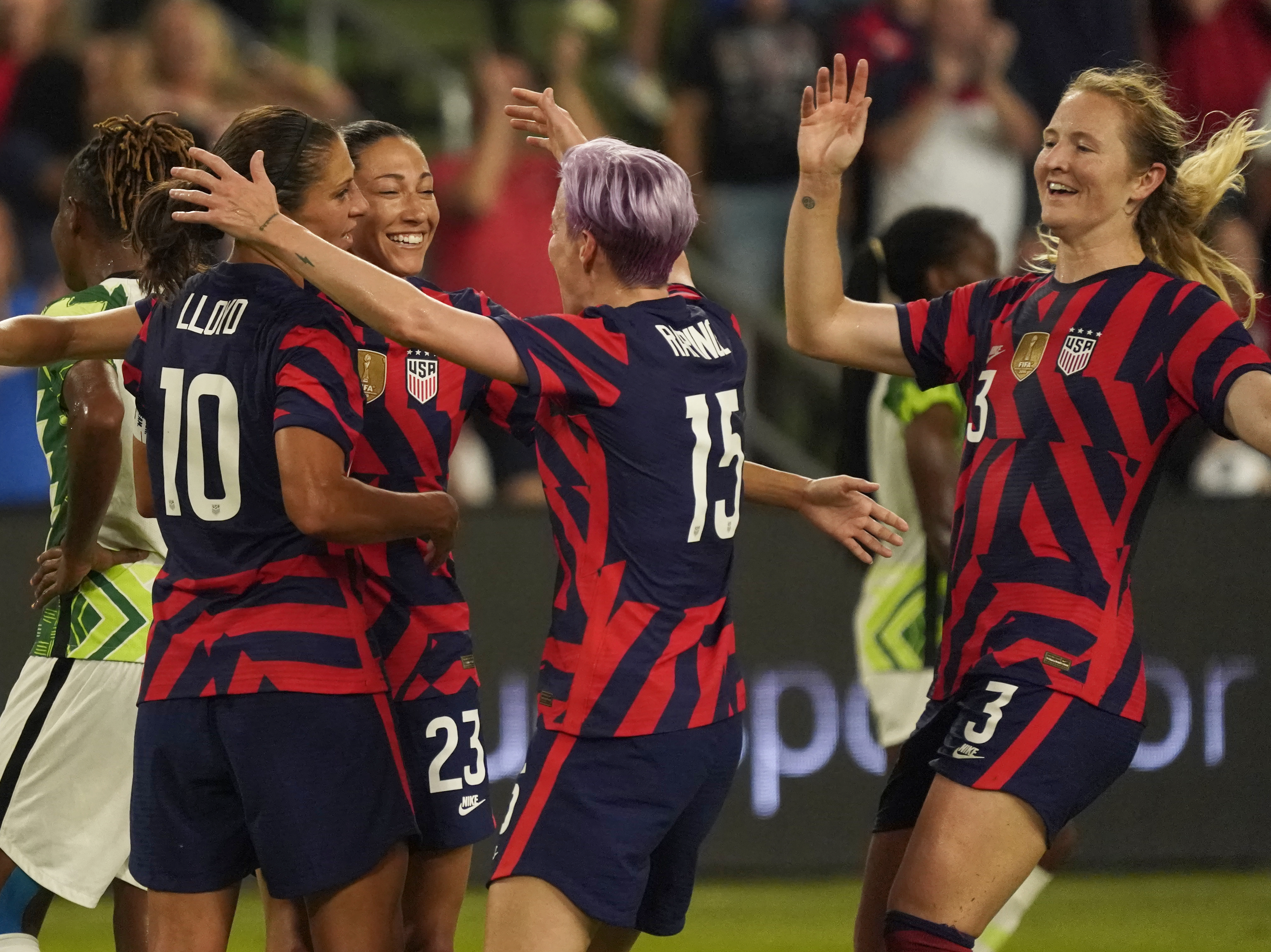 caption: Most of the winning U.S. team from the 2019 Women's World Cup will reunite for the Tokyo Olympics, including Carli Lloyd, Christen Press, Megan Rapinoe and Samantha Mewis. They seen here last week in Austin, Tex., where they beat Nigeria 2-0.