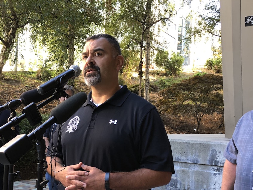 caption: King County Police Officers Guild President Mike Mansanarez says their latest contract includes a twenty percent pay raise over the next three years, which should help them hire more officers.  