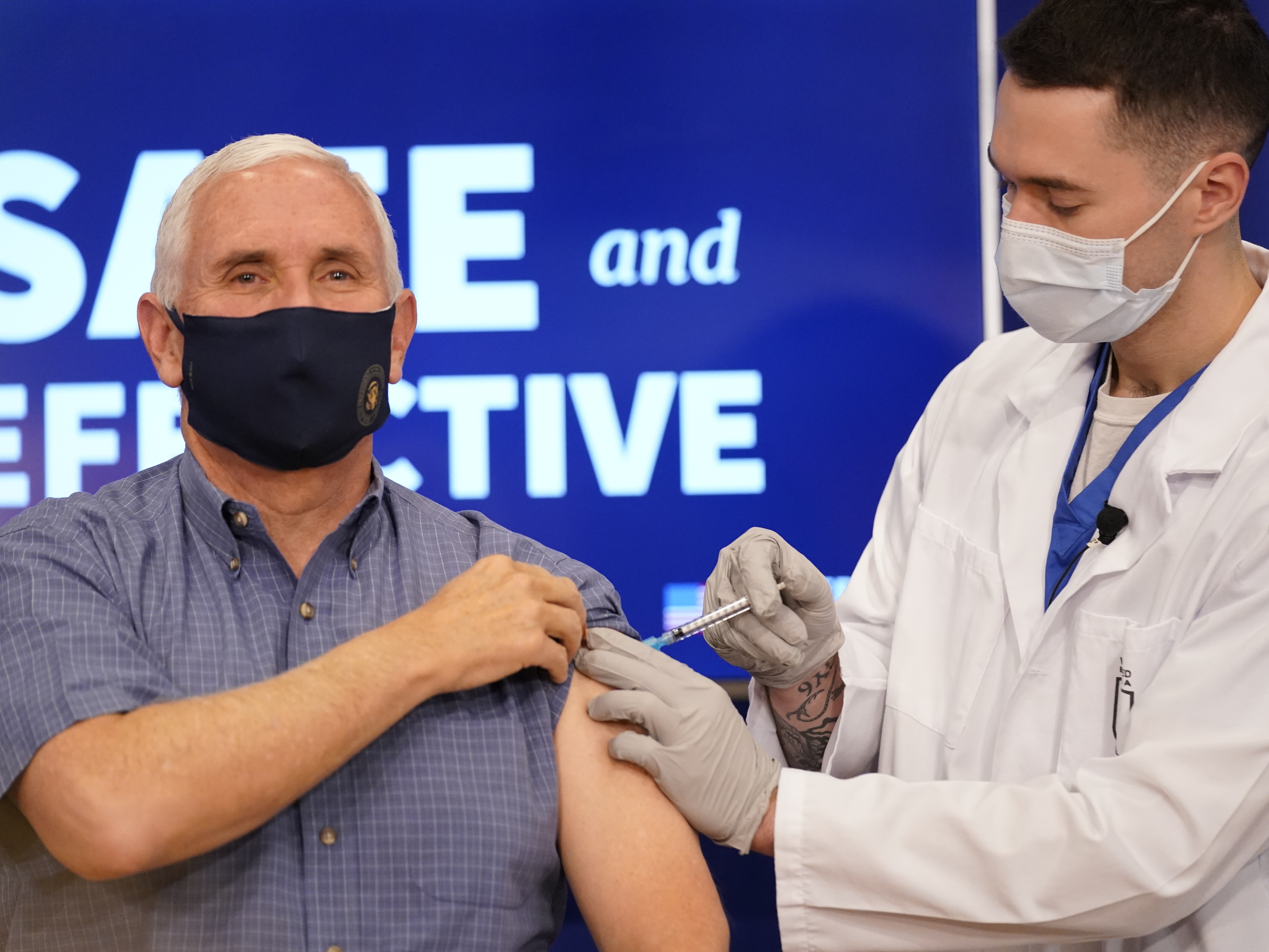 caption: Vice President Mike Pence receives a Pfizer-BioNTech COVID-19 vaccine shot at the Eisenhower Executive Office Building on the White House complex on Dec. 18.
