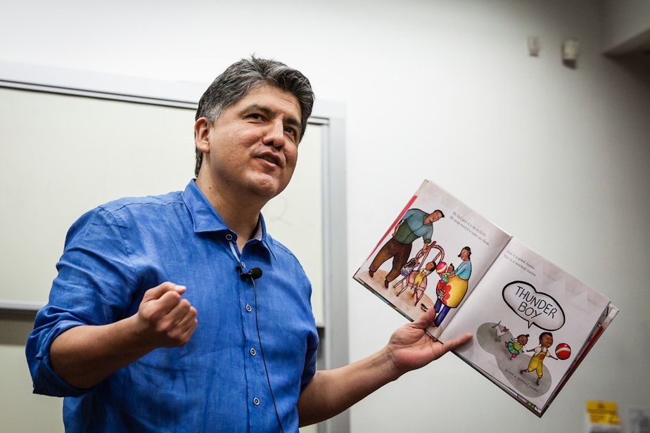 caption: File: Sherman Alexie reads from his book, 'Thunder Boy Jr.,' at the RED INK Indigenous Initiative for All at Arizona State University, Tempe, April 22, 2016.