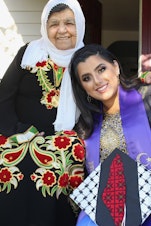 caption: Sabrene Odeh with her grandmother Zakieh.