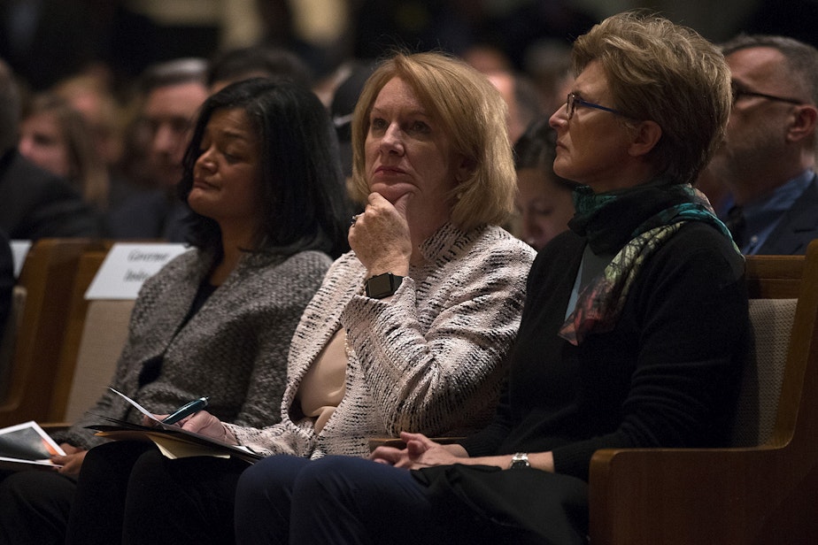 caption: Seattle mayor Jenny Durkan listens during a community vigil for Pittsburgh on Monday, October 29, 2018, at the Temple De Hirsch Sinai on 16th Avenue in Seattle.