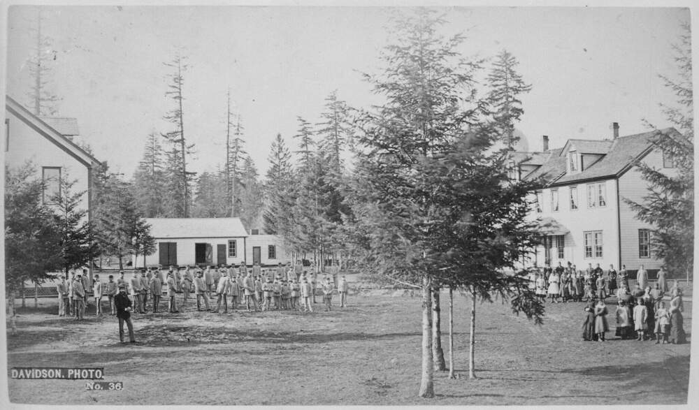 caption: The Forest Grove Indian Industrial Training School in Oregon was a boarding school for Native American children that operated from 1880 to 1885. (Courtesy of National Native American Boarding School Healing Coalition)
