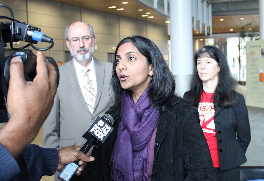 caption: Seattle City Councilmember Kshama Sawant is spearheading a proposal concerning 'slumlord' properties in Seattle.
