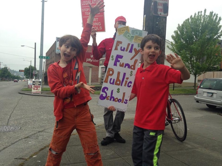 caption: Kids on the picket lines in Seattle.
