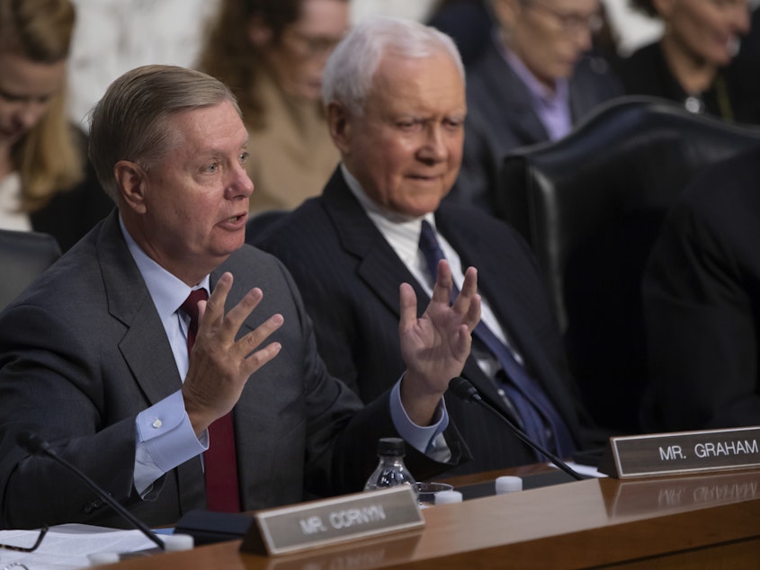 caption: Sen. Lindsey Graham, R-S.C., joined by Sen. Orrin Hatch, R-Utah, (right) last week during questioning of Supreme Court nominee Brett Kavanaugh.