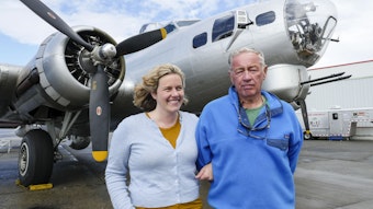 caption: Reporter Ashley Ahearn with her father Joe Ahearn Jr. Ahearn researched the history of the Boeing B-17 bomber, said to have won the war. Boeing recruited workers from around the country to build the bomber -- many were women, and many were black.