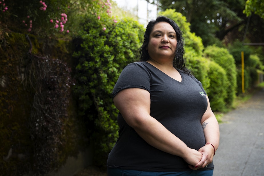 caption: Victoria Lopez, certified medical assistant at Greenlake Primary Care, is portrayed on Tuesday, June 20, 2023, outside of the clinic in Seattle. 
