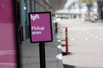 caption: With many U.S. cities on lockdown, demand for rides has dried up, exacerbating the financial woes of ride-hailing apps like Lyft.