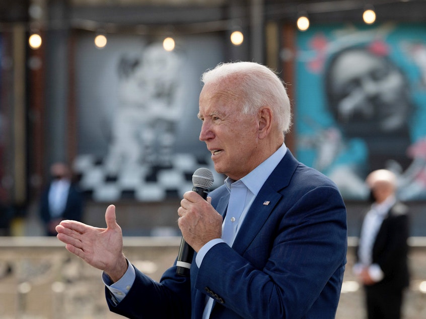 caption: Democratic presidential candidate Joe Biden speaks at the Black Economic Summit at Camp North End in Charlotte, N.C., on Wednesday. In a letter, nearly 500 national security experts have endorsed Joe Biden for president.