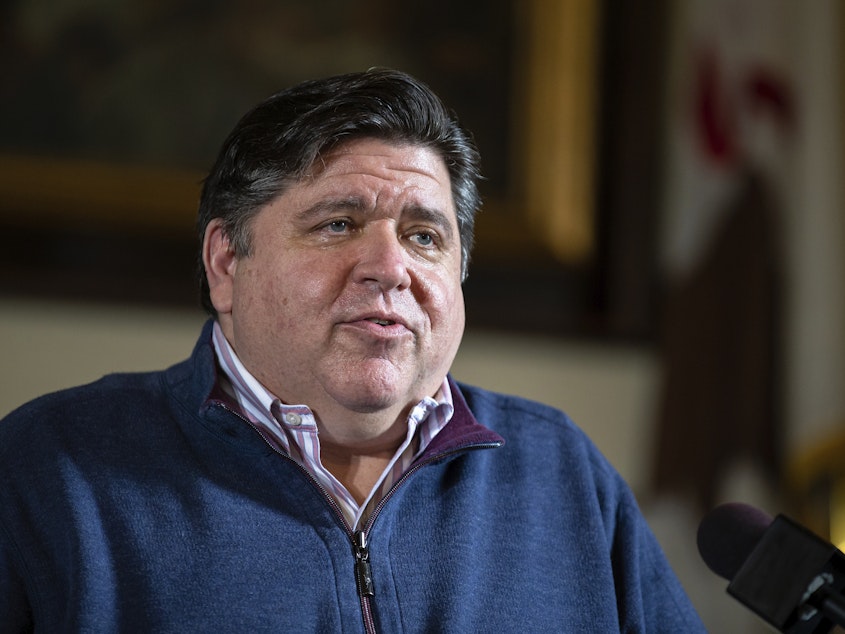 caption: Gov. J.B. Pritzker, pictured at the Illinois State Capitol in May 2020, has signed legislation that makes his state the first in the nation to require the teaching of Asian American history in public schools.