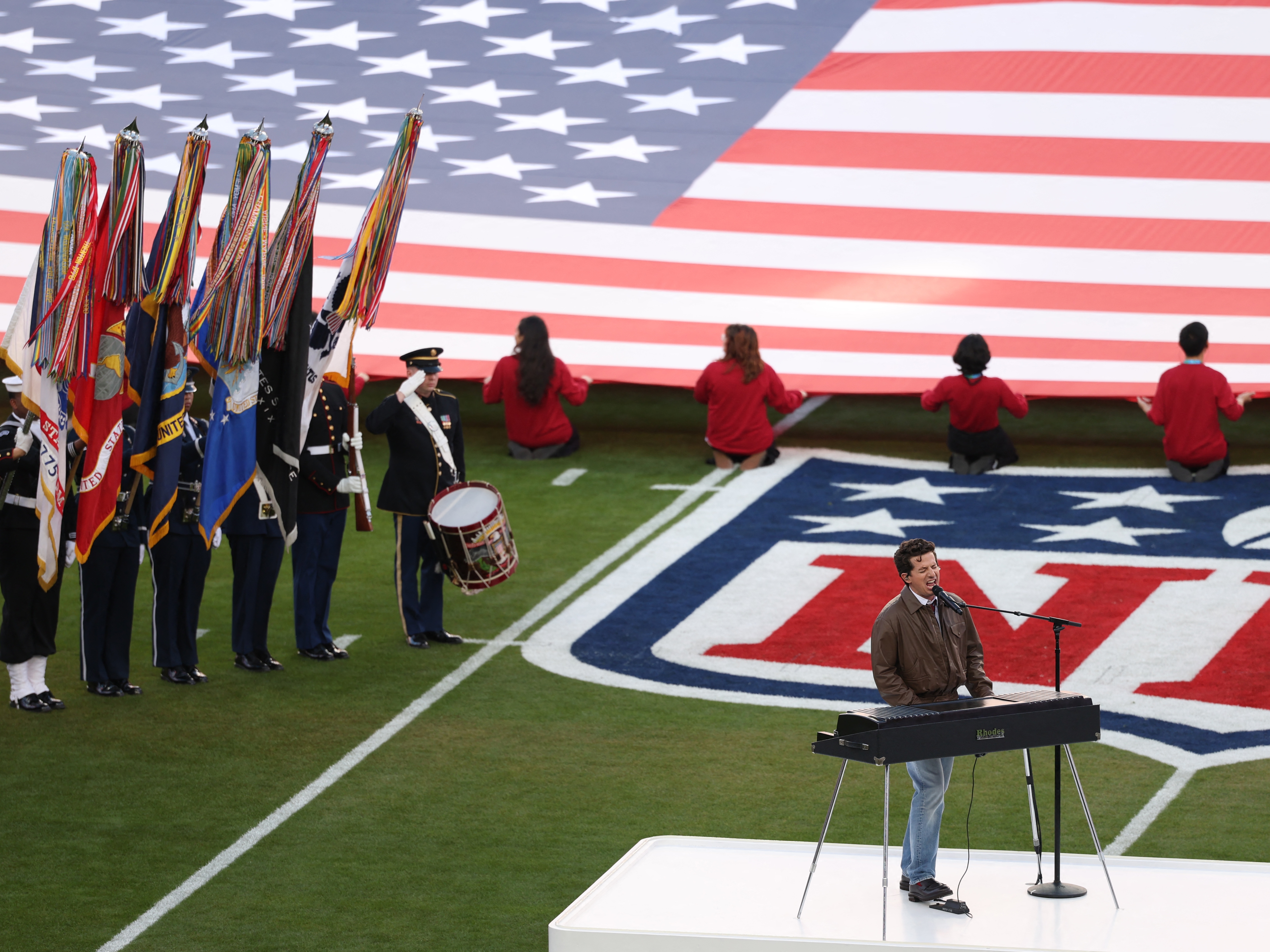 caption: Singer Charlie Puth performs the national anthem ahead of this year's Super Bowl on Feb. 8. One prediction market trader made thousands of dollars by listening to a rehearsal of the event and correctly guessing how long Puth's rendition of the anthem would take.