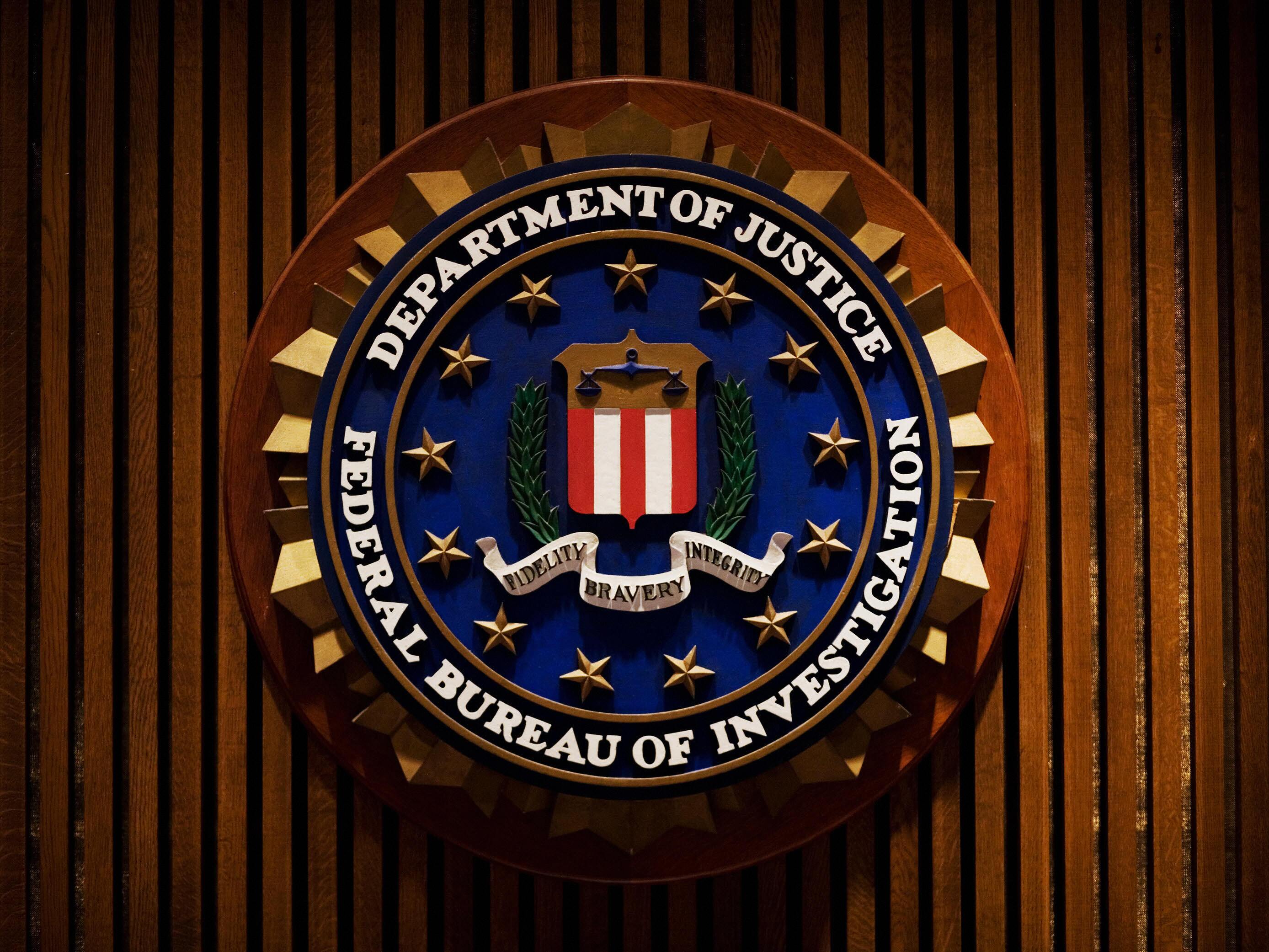 caption: The FBI crest