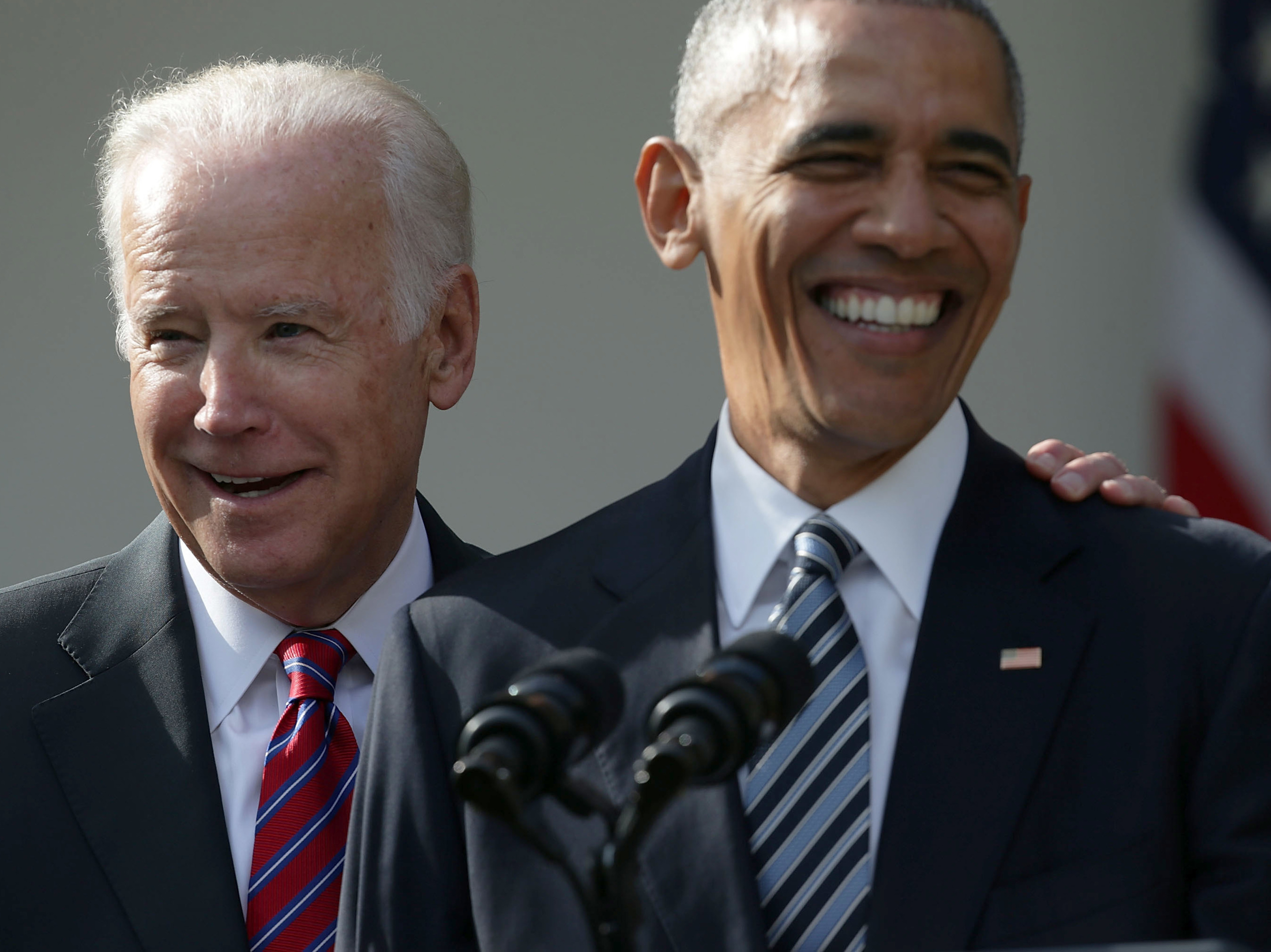 caption: WASHINGTON, DC - NOVEMBER 09, 2016: U.S. President Barack Obama and Vice President Joseph Biden share a moment during a statement about the election in the Rose Garden.