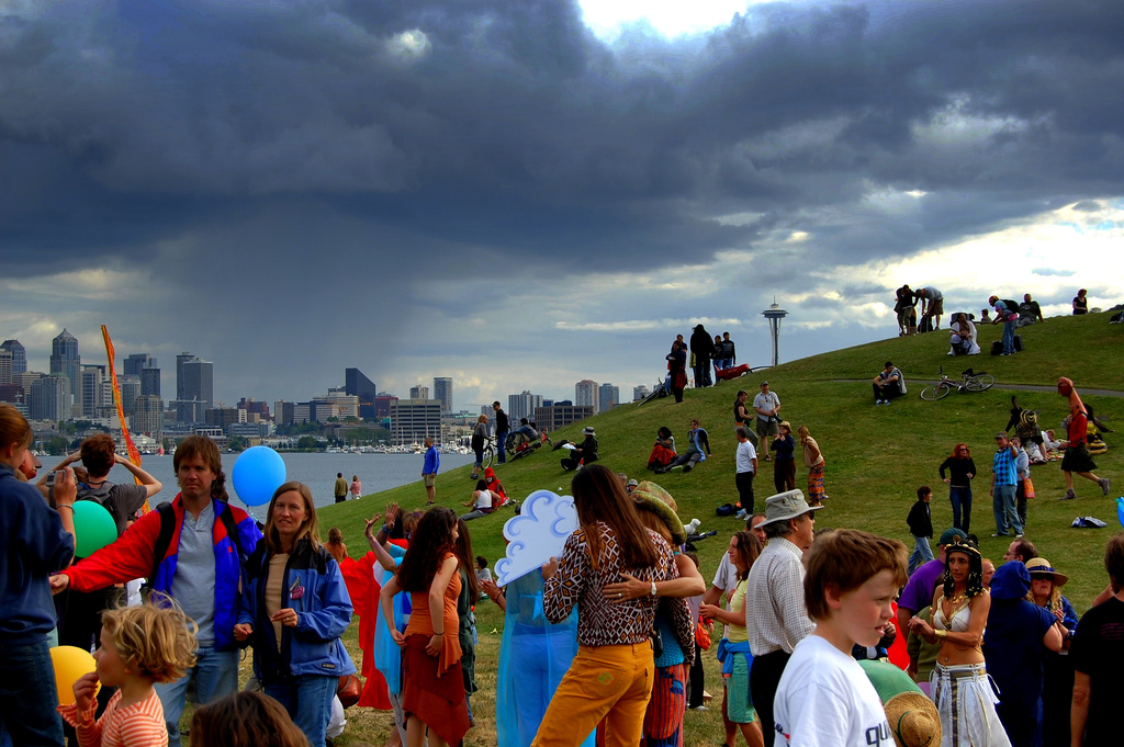 caption: Seattleites find a number of ways to celebrate the summer solstice, including dancing at Gas Works Park. One church used to stage sword fights, but has since changed traditions.
