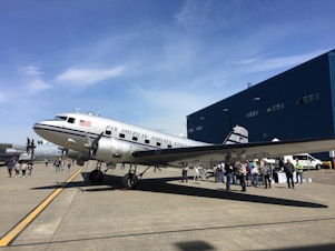 caption: The vintage DC-3 owned by Historic Flight Foundation was on display at Sea-Tac Airport in early May before commencing its long trip to Europe.
