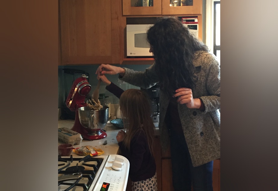 caption: Katherine baking chocolate cookies with Marlo's daughter.