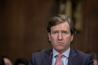 caption: Christopher Krebs, director of the Cybersecurity and Infrastructure Security Agency, speaks before the Senate Judiciary Committee in May 2019.