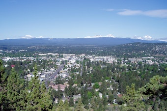 caption: Bend, Oregon, earns the moniker of being a Zoom town by virtue of strong in-migration and soaring home sales during the pandemic.
