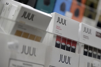 caption: Juul products are displayed at a smoke shop in New York on Dec. 20, 2018.