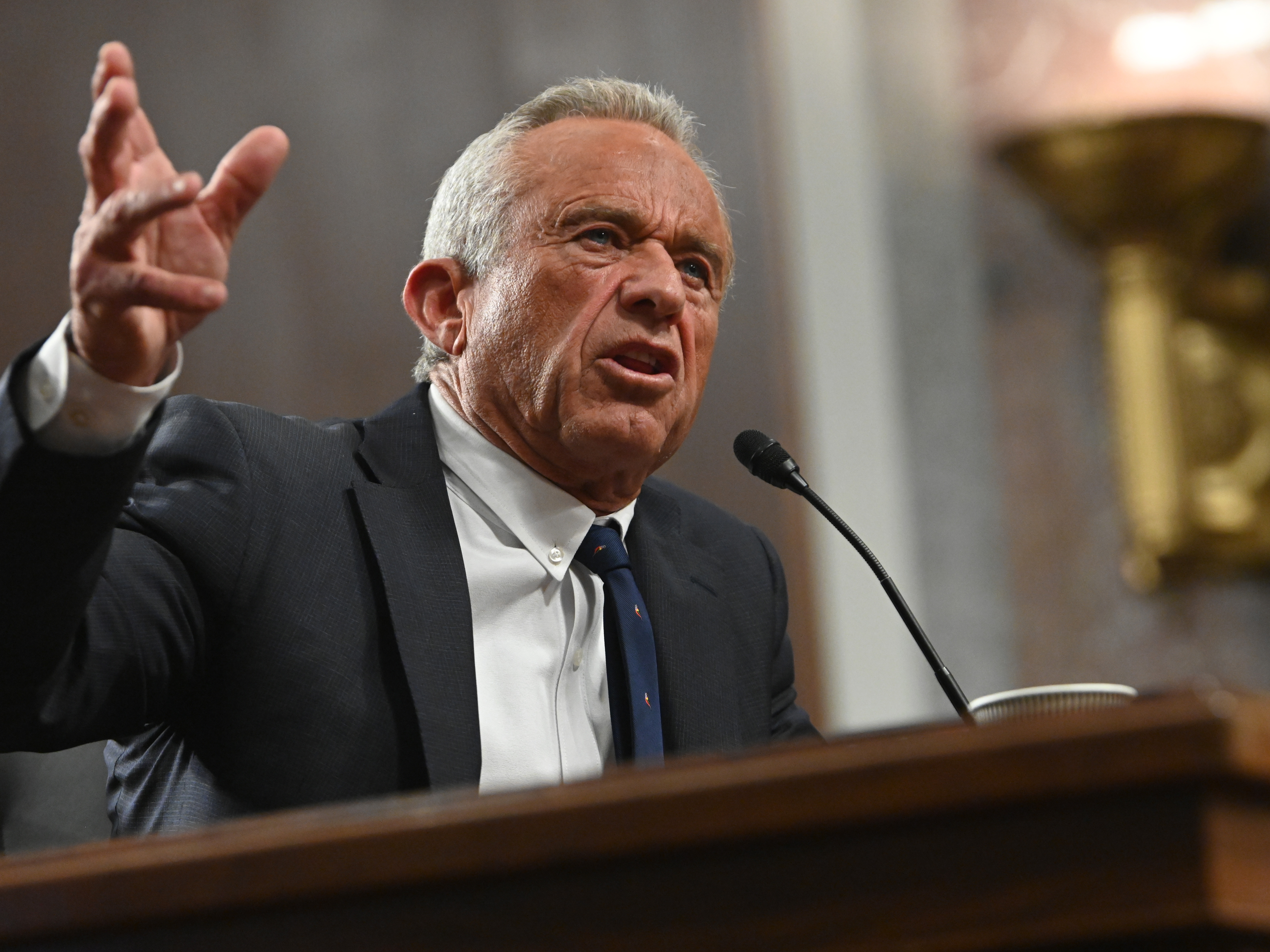 caption: Robert F. Kennedy Jr. testifies during his confirmation hearing at the Senate Finance Committee on Jan. 29. The full Senate voted to confirm him as Secretary of the Department of Health and Human Services on Thursday.