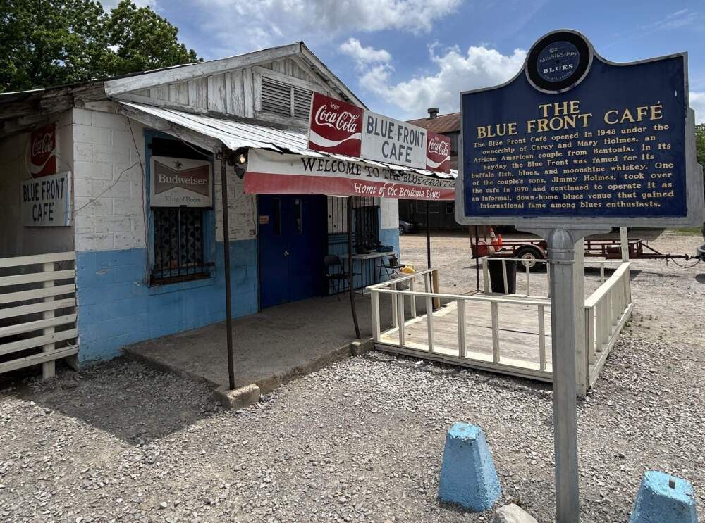 caption: The outside of The Blue Front Cafe, one of the last remaining juke joints in the Mississippi area. (Betto Arcos)