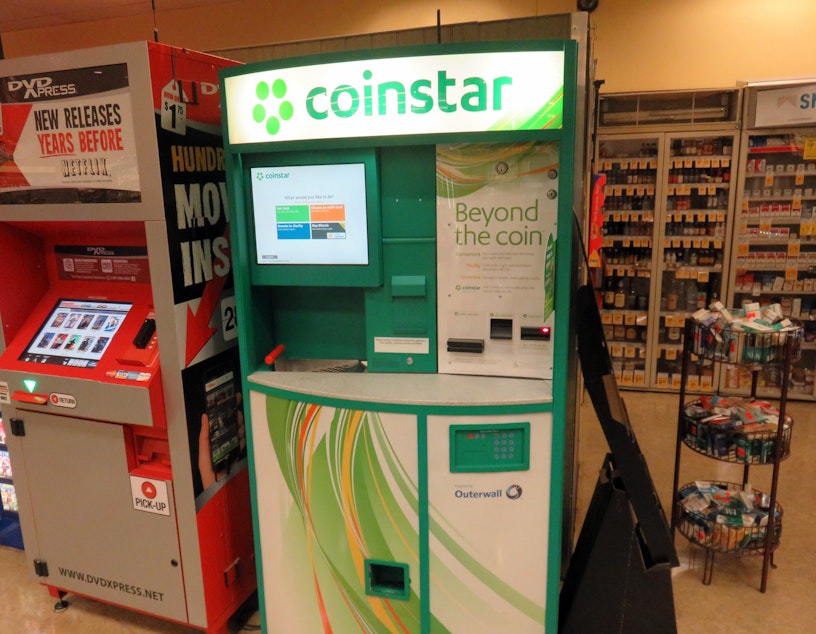 caption: You can now buy bitcoin at select Coinstar kiosks in Washington and two other states, including at this one in Tumwater, Washington.