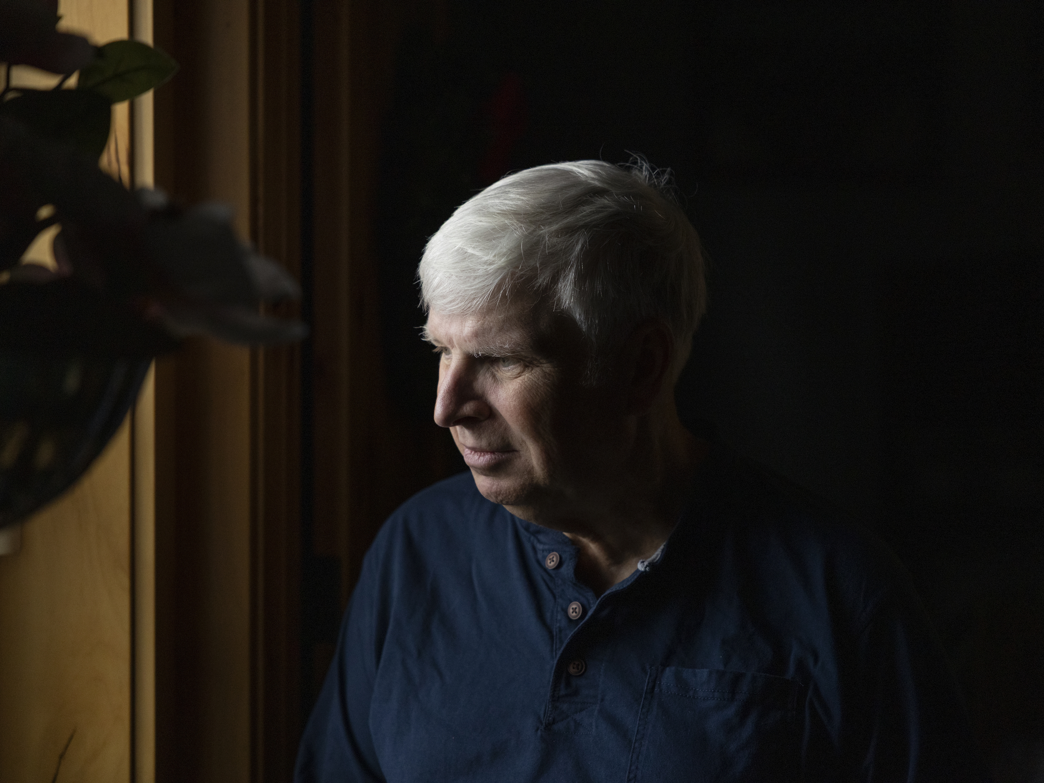 caption: Erik Jensen, 67, is seen at his home in Warrenton, Ore. He served in the Navy for 30 years before retiring in 2007. While veterans are entitled to free support from accredited services to navigate their disability benefits, Jensen sought out the services of Trajector Medical. The company charged him $12,000.