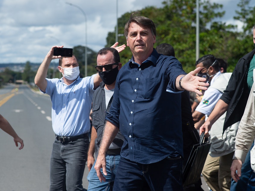 caption: Brazilian President Jair Bolsonaro is seen at a demonstration in favor of his government on Sunday.