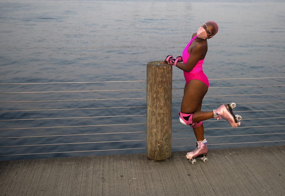 caption: Miracle Sepúlveda poses for portrait on Wednesday, September 30, 2020, during a Seattle Skates meet up along Alki Avenue Southwest in Seattle.