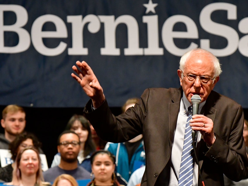 caption: Vermont Sen. Bernie Sanders speaks at a rally in downtown St. Louis on Monday.