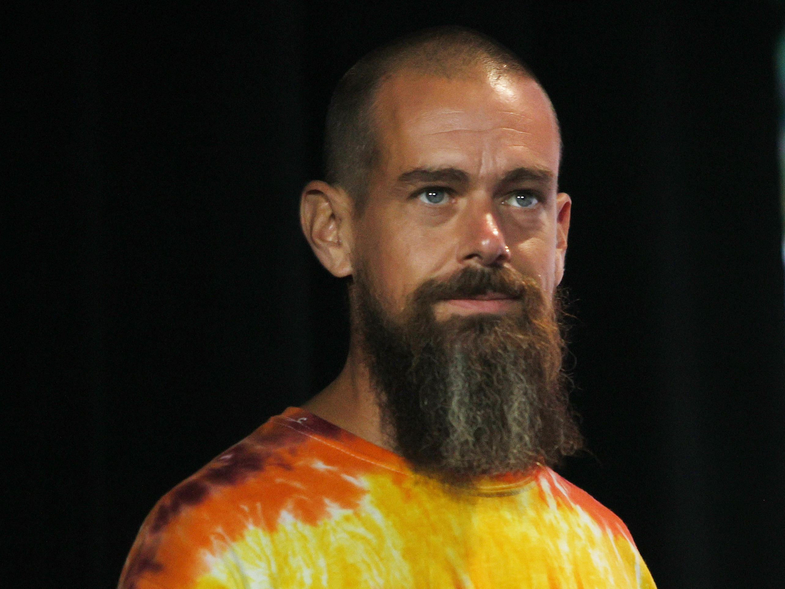 caption: Jack Dorsey is stepping down as the CEO of Twitter, which he co-founded. Here he's shown at a bitcoin convention in June.