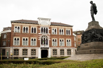 caption: The exterior of Casa Verdi, founded by famed Italian composer Giuseppe Verdi in the late 1890s.