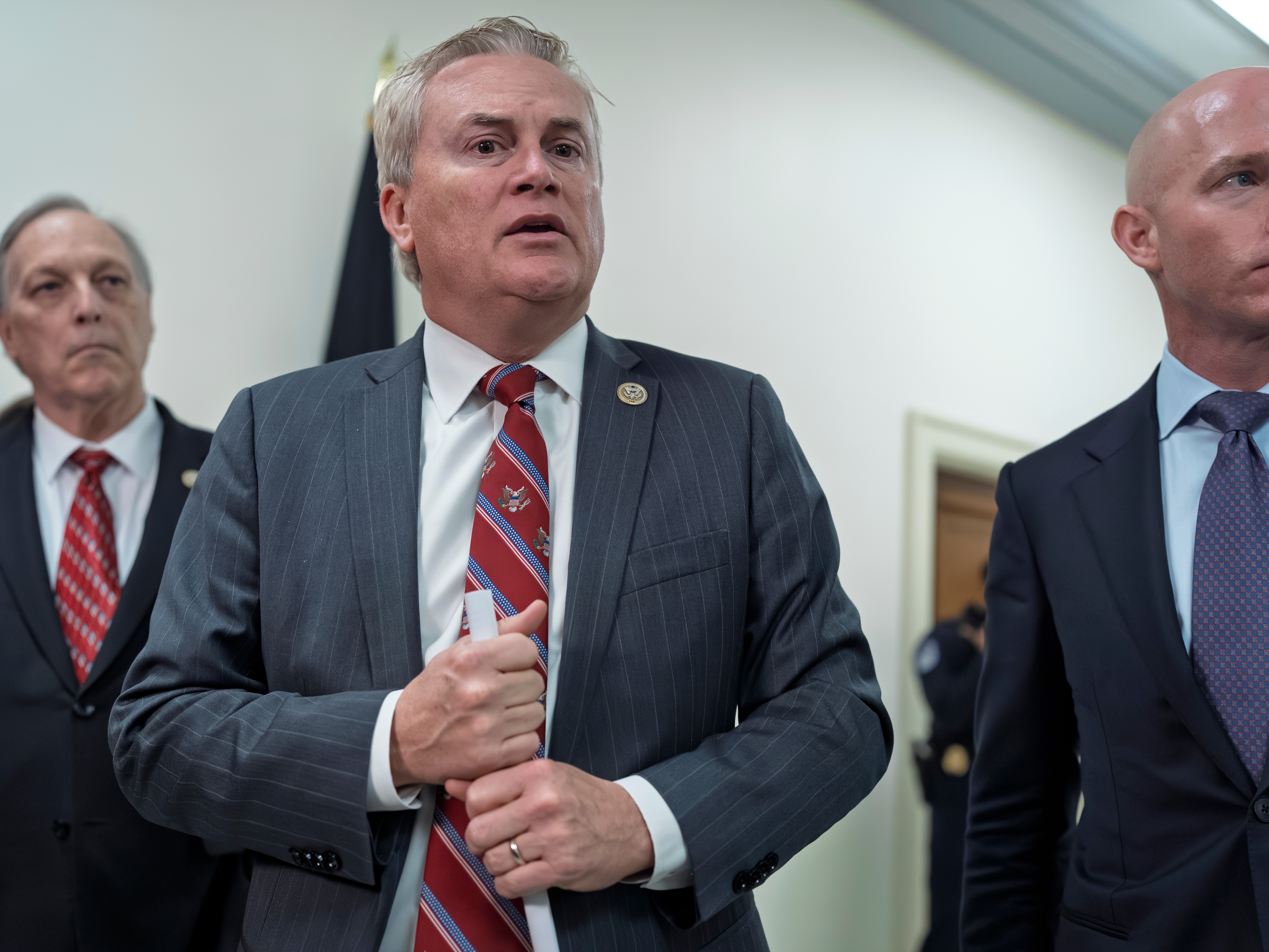 caption: House Oversight Committee Chairman James Comer, R-Ky., flanked by Rep. Andy Biggs, R-Ariz., left, and Rep. William Timmons, R-S.C., speaks to reporters after a closed-door deposition with Ghislaine Maxwell, the former girlfriend and confidante of sex trafficker Jeffrey Epstein, at the Capitol in Washington, Monday, Feb. 9, 2026.