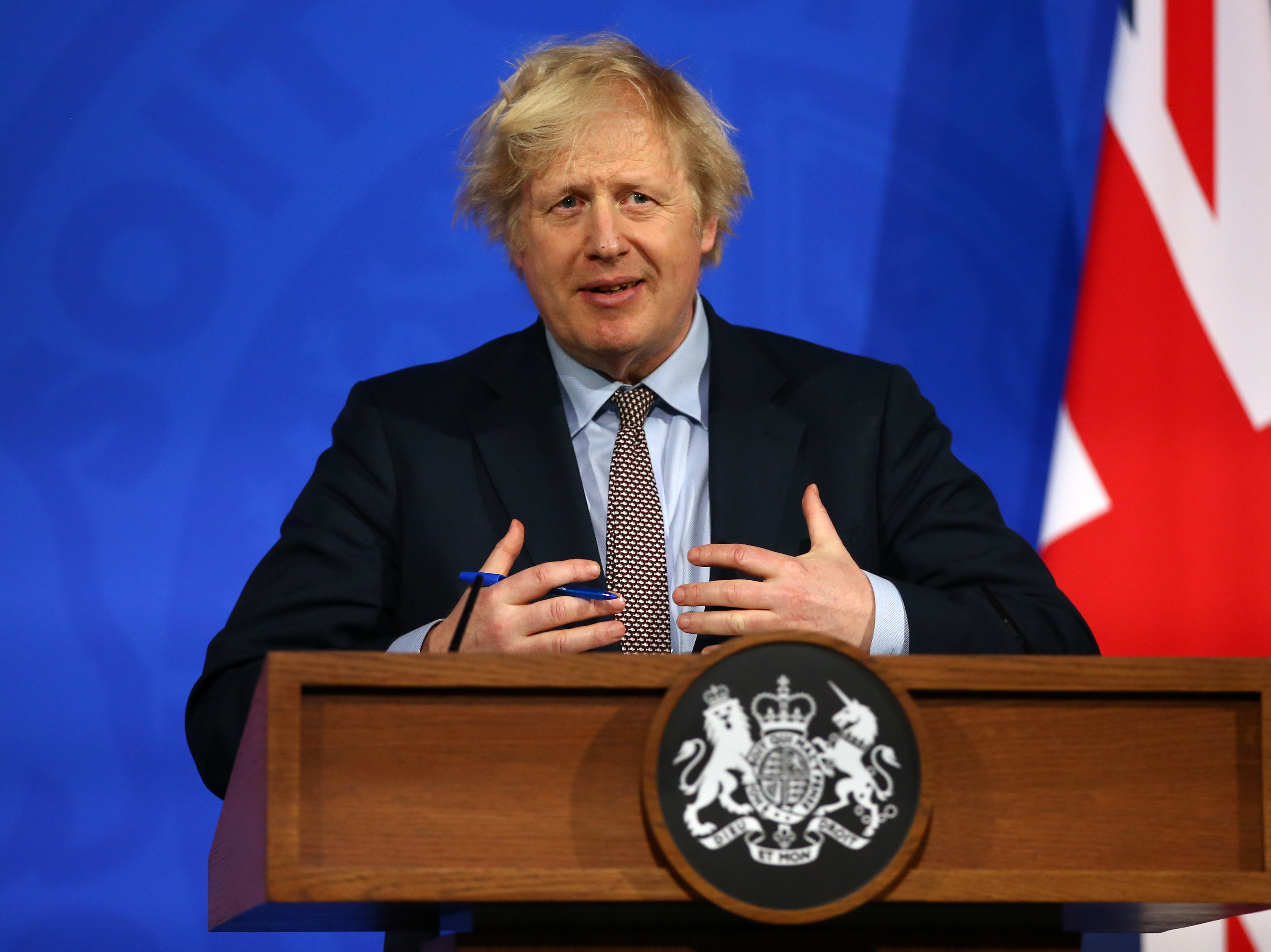 caption: Britain's Prime Minister Boris Johnson gives an update on the coronavirus pandemic during a virtual news conference in London on Monday. Johnson and other world leaders signed a letter calling for greater international cooperation in fighting future pandemics.