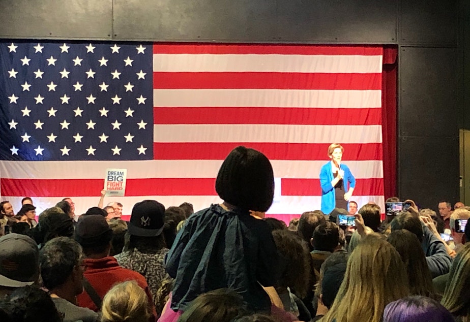 caption: Elizabeth Warren visited Seattle on the same day as the Nevada caucuses.