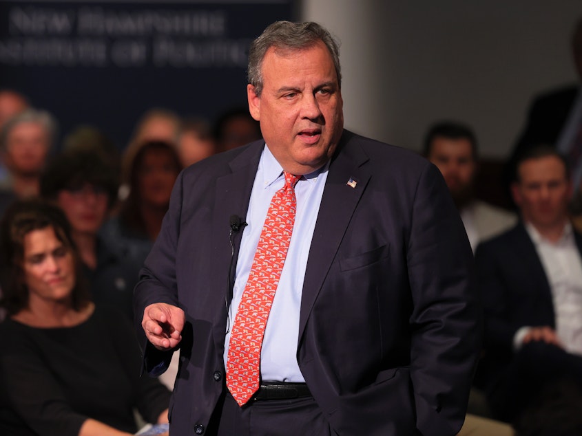 caption: Former New Jersey Gov. Chris Christie speaks at a town hall-style event at the New Hampshire Institute of Politics at Saint Anselm College on June 6, Manchester, N.H.